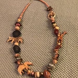 Safari animal necklace made from carved wood, beads and other materials. 30 in.
